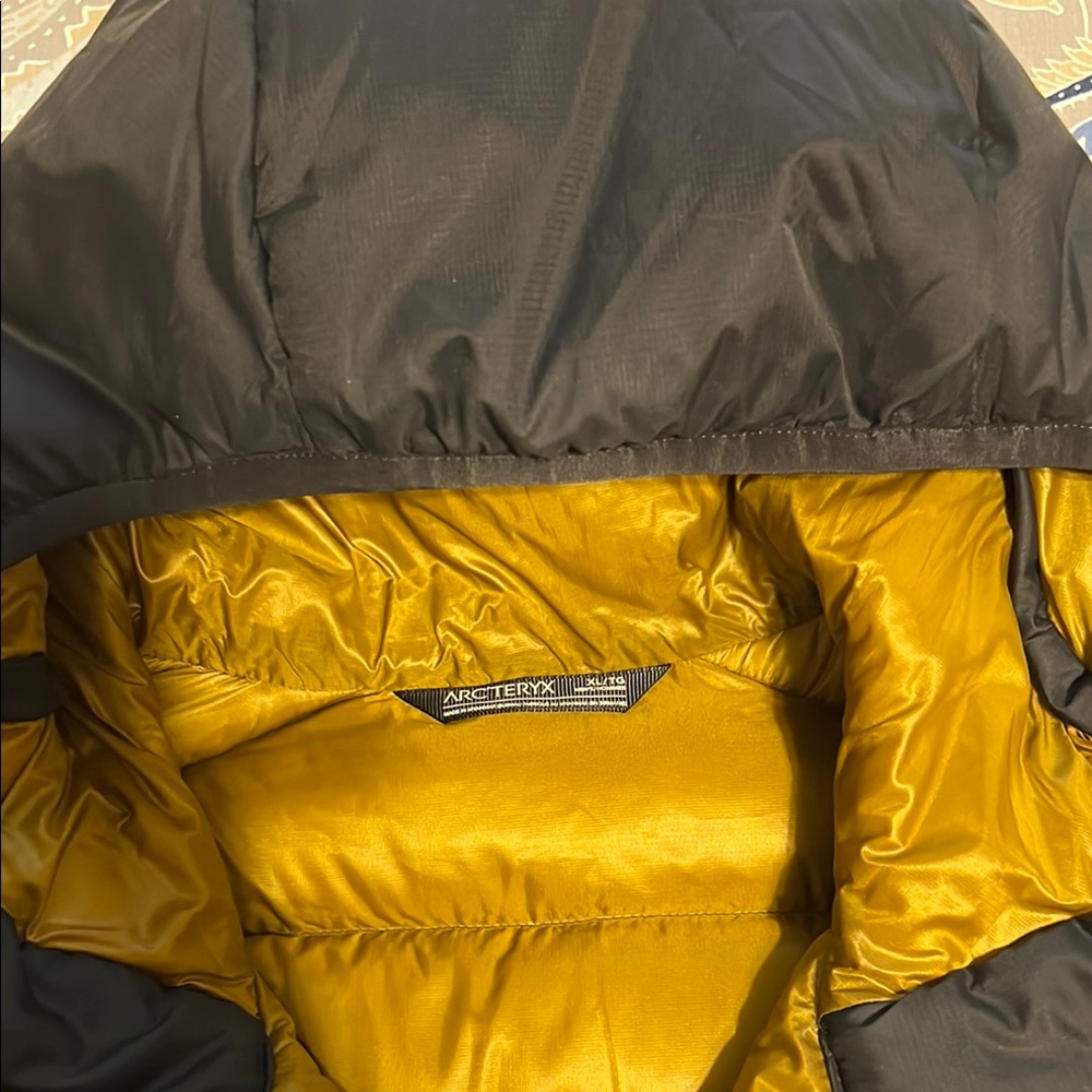 Arc'teryx Black and Yellow Insulated Jacket